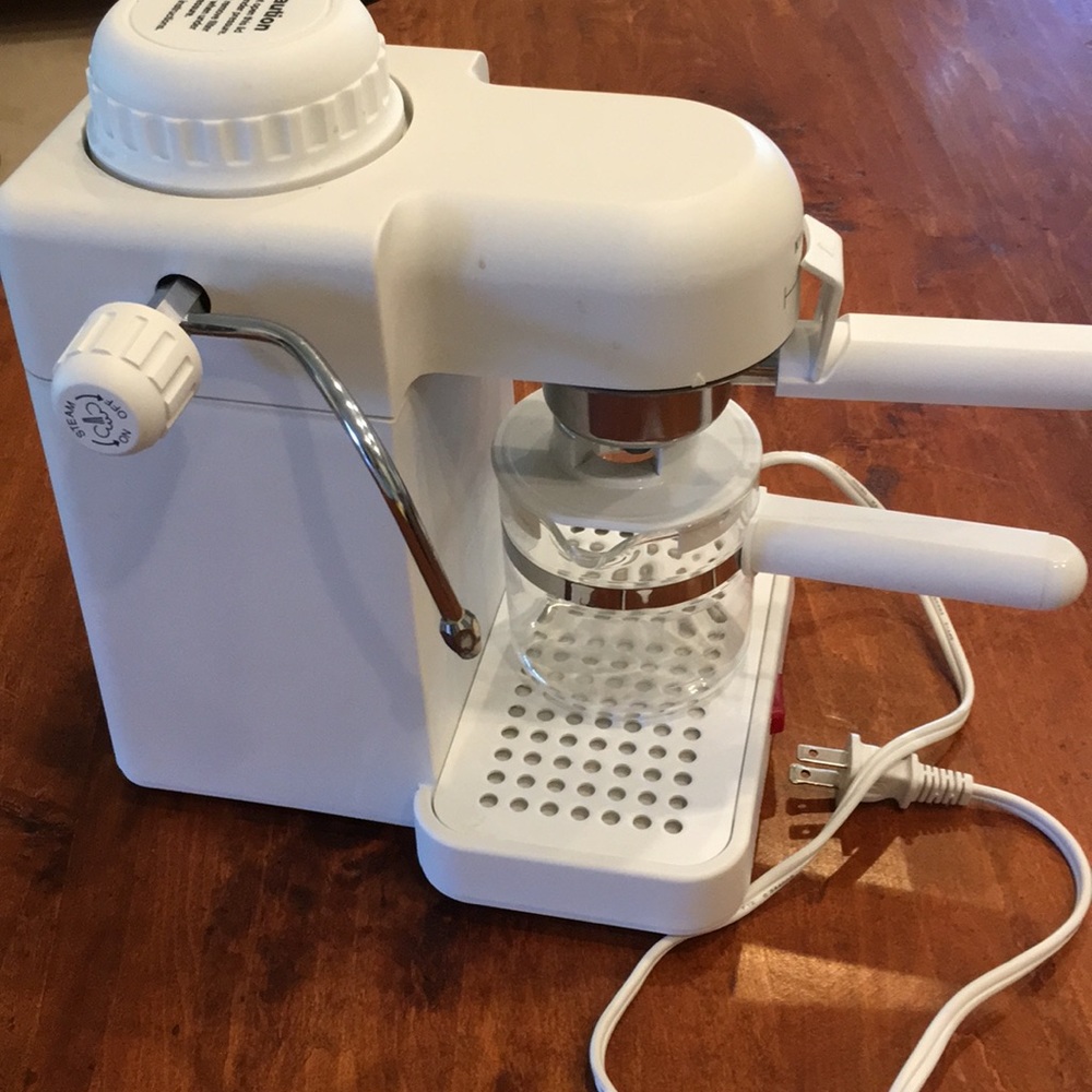Espresso Mini. Never used. Cups and instructions